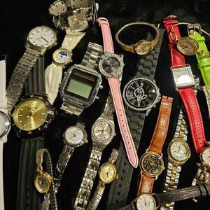 20 used watches, as is. Firm